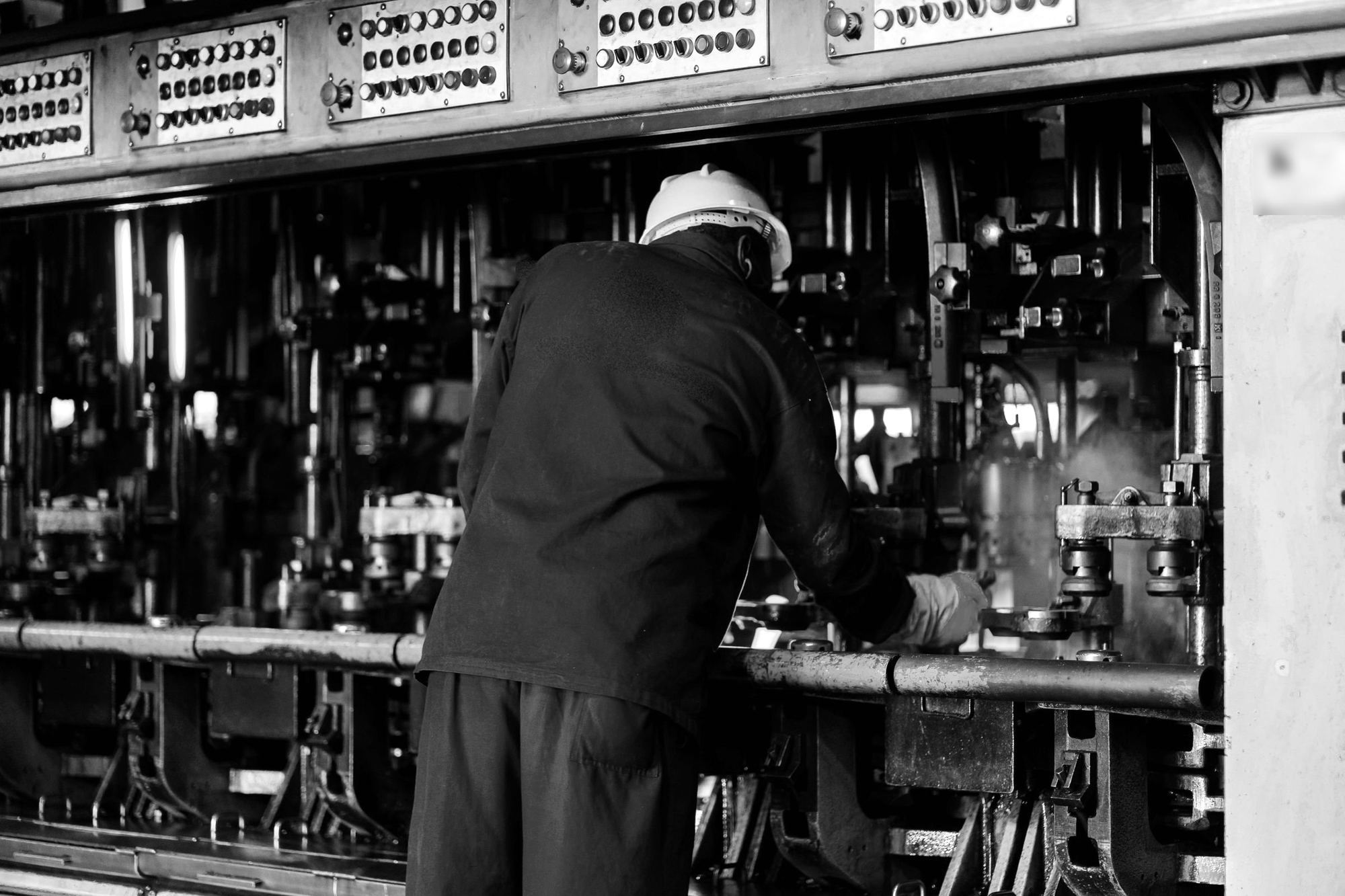 A machine operator on a production line