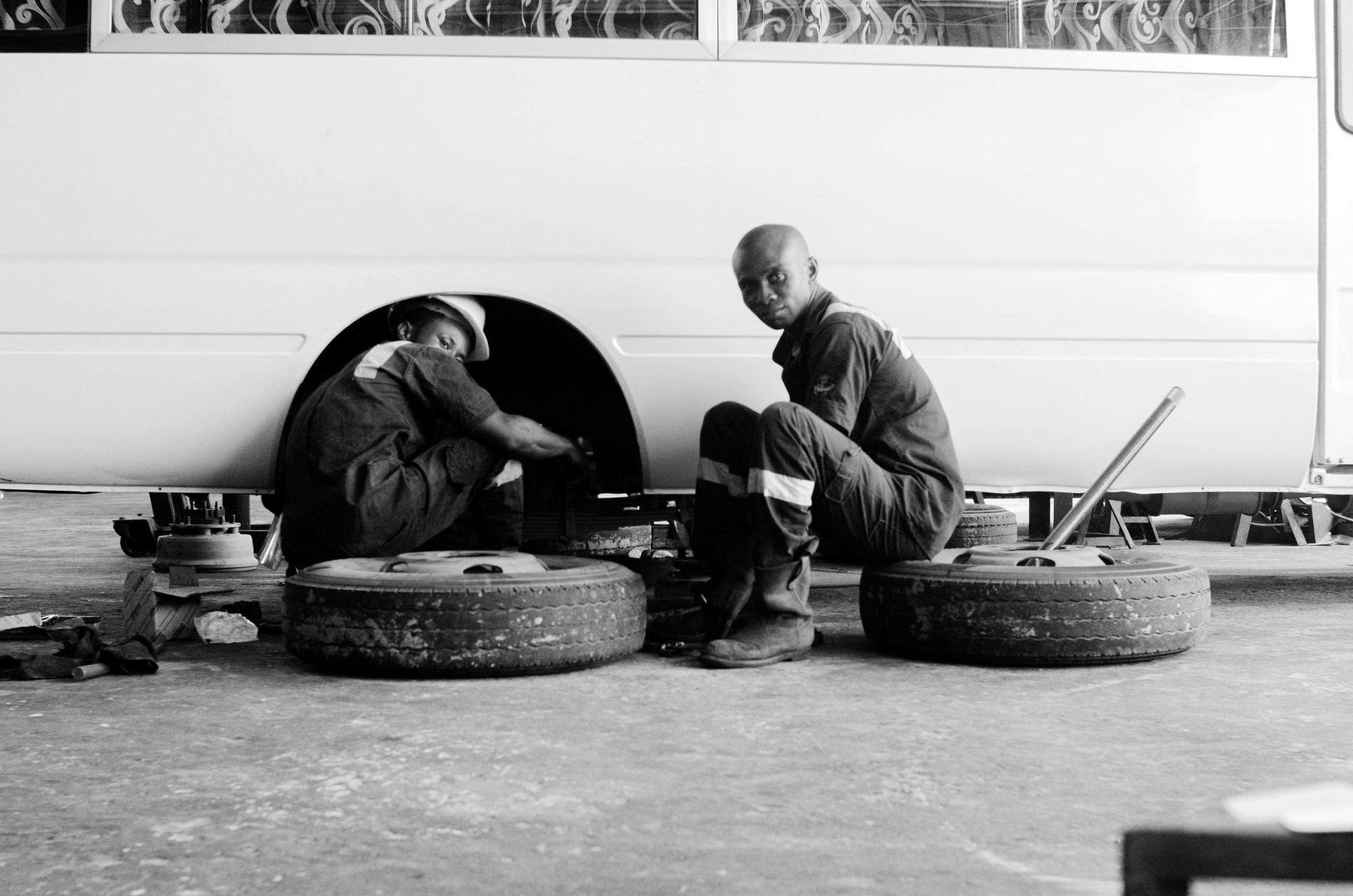 Mechanics at work in a workshop